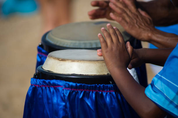 istock Percussionist hands playing atabaque. musical rhythm. African music. 1991128281