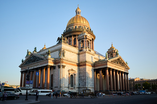 Saint Petersburg, Russia - June 10, 2023: St. Isaac's Cathedral is the largest cathedrals in the world on a sunny day, St. Petersburg, Russia, cloudy sunny evening sky background