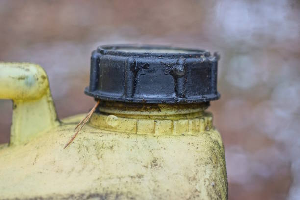 istock one yellow dirty plastic canister with a black lid 1991153635