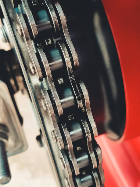 istock Chain link. Macro photo of lubricated chain, motorcycle engine starting system. Grease and lubricating oil 1991172254