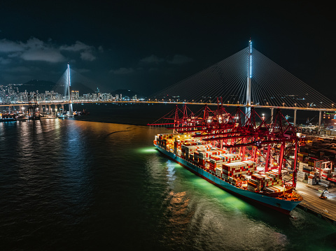 Drone view of Stonecutters Bridge and the Tsing sha highway at night