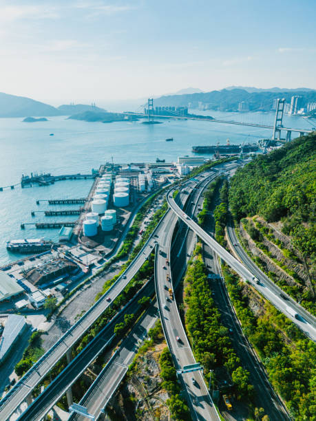 view of elevated road in tsing yi, hong kong - fuel storage tank industrial building construction development zdjęcia i obrazy z banku zdjęć