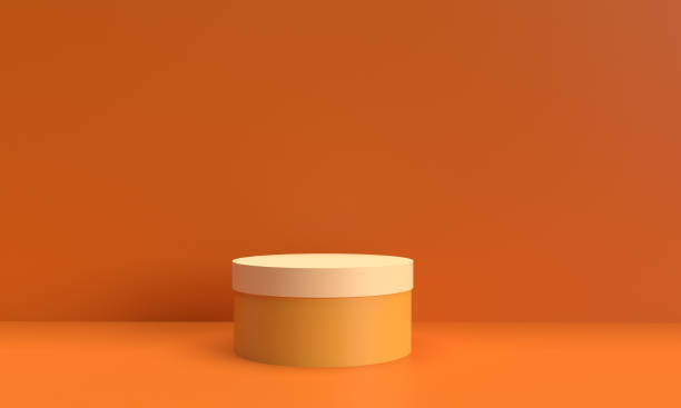 istock Podium stage stand showcase pedestal platform modern product empty blank cream orange yellow color background wallpaper shape template minimal display presentation geometric studio light circle round 1991199150