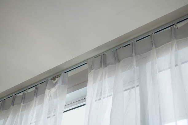 istock Curtain window interior decoration in living room 1991211101
