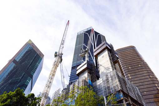 Construction of skyscrapers in the city, background with copy space, full frame horizontal composition