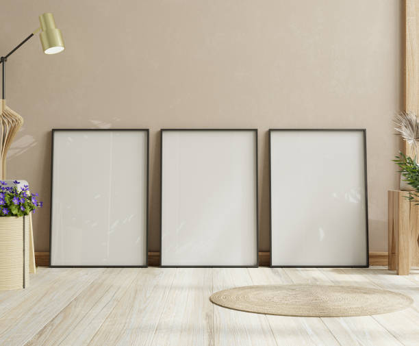 istock Set of 3 frame mockup and decor on dark cream color wall background 1991312143