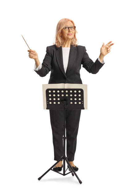 Female conductor behind a music note stand isolated on white background