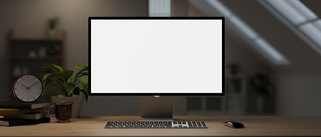 A computer desk with a white-screen computer mockup, a keyboard, a wireless mouse, and accessories on a hardwood table in a room. home office workspace concept. 3d render, 3d illustration