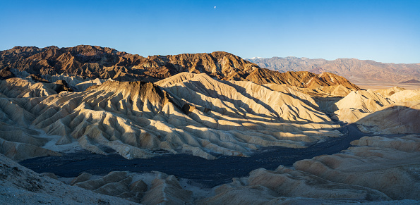 Zabriskie Point in Death Valley National Park in California at dawn.