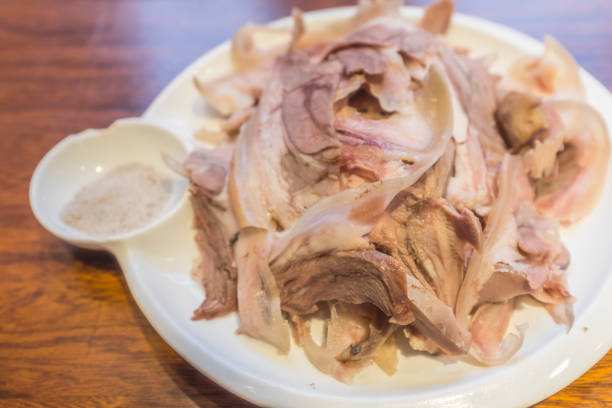 istock Cut cooked lamb into small pieces for dipping and consumption 1991620195