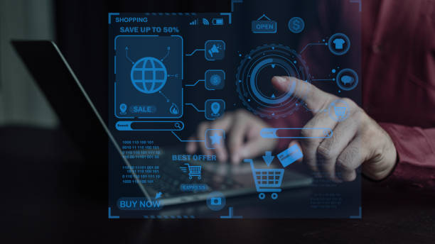 istock Internet store buy online e-commerce concept Person's hand using smartphone with shopping chart on laptop screen and shopping cart business icons, internet concept of e-commerce technology 1991689835