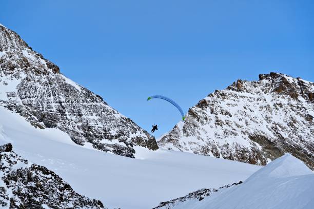 istock paraglider above the jungfrau 1991701339