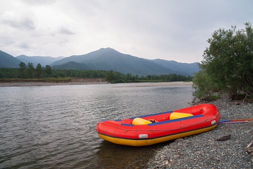 Raft by the river. The concept of tourism, rafting, rafting.