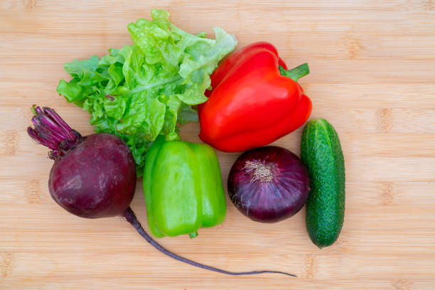 Healthy fresh vegetables on a wooden board for cutting. Healthy lifestyle diet.
