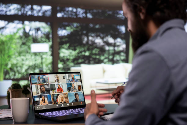 istock Chief executive director discusses with creditors via videocall 1991926004