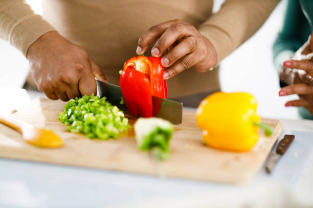 istock Close up of cutting bell peppers. 1991935985