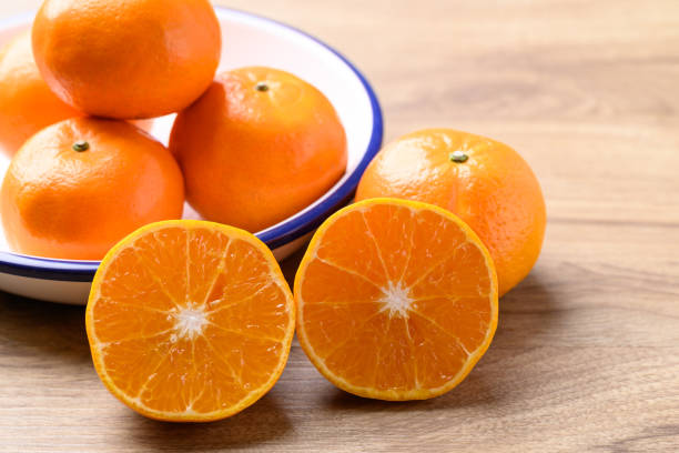 istock Mandarin orange fruit in bowl, Tropical fruit 1991938570