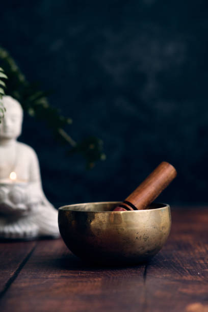 istock Tibetan bowl on a dark background 1991941263