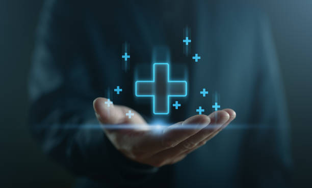 istock Businessman interacting with a blue plus sign, representing a mindset of positivity, mental health care, and insurance in mental rejuvenation, positive thinking mindset. Good, best. 1991952748