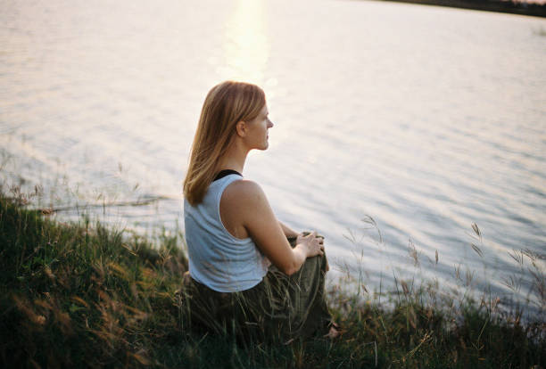 istock white blond woman in touch with nature 1991977594