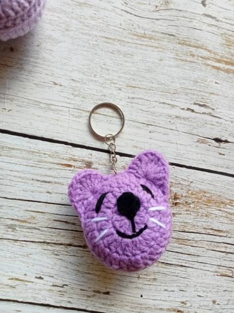 istock Crochet face cat, keychain Handmade diy craft crocheted For illustration, background image texture 1991993911