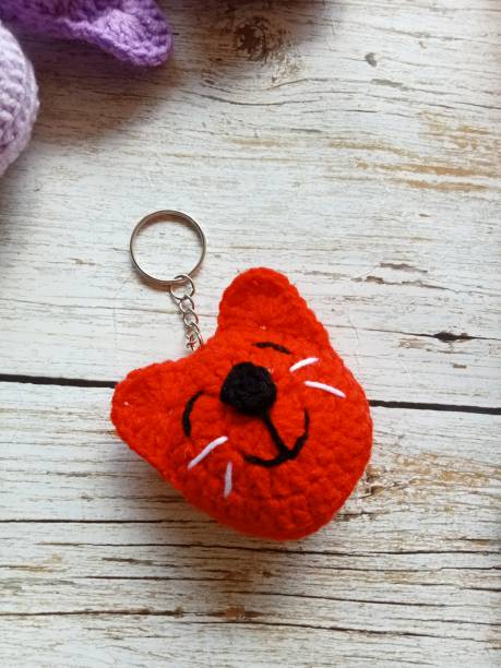 istock Crochet face cat, keychain Handmade diy craft crocheted For illustration, background image texture 1991996188