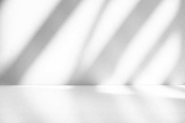 istock Wall interior background, studio and backdrops show products.with shadow from window color white . background for text insertion and presentation product 1992018084