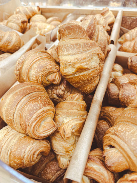 istock Croissants on a counter in a market 1992023906
