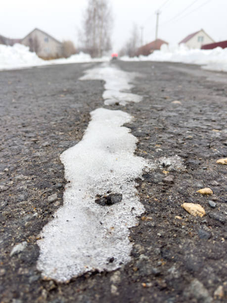 istock Snow on an asphalt road in winter 1992023916