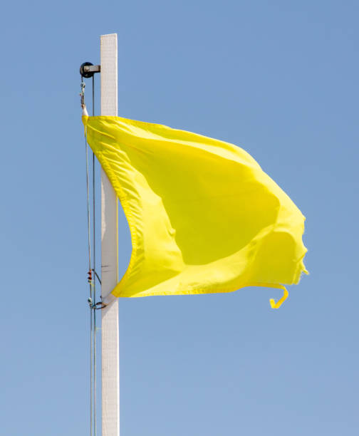 istock A yellow flag against a blue sky 1992029227