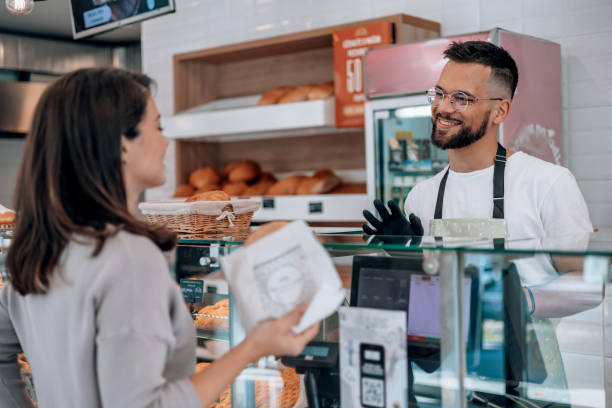 istock Customer's secure credit card payment at the bakery 1992036637