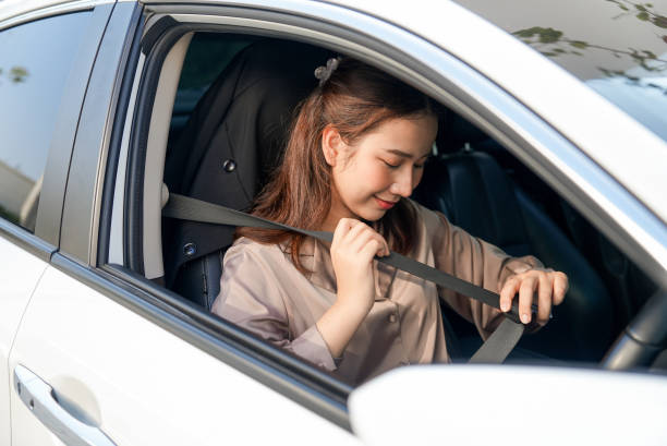 istock asian women getting new car. 1992048176