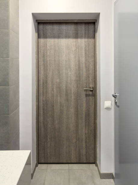 istock Wooden interior door as a background 1992049101