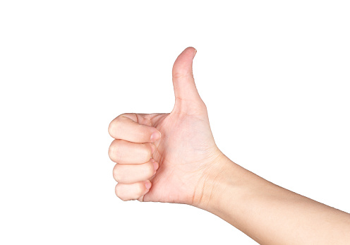 Woman showing a thumbs up on white