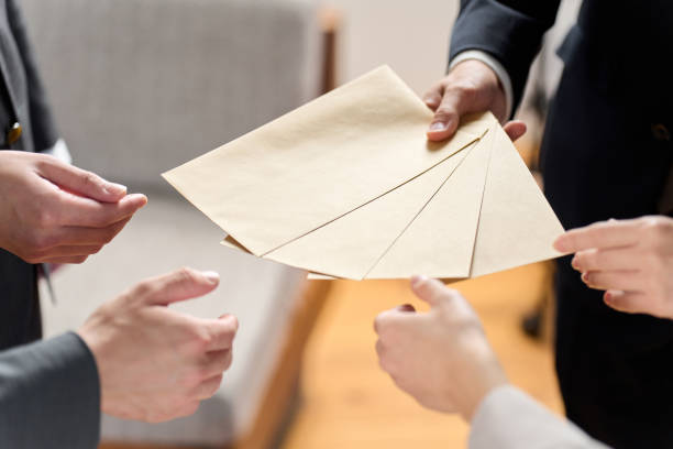 istock Business person receiving an envelope 1992053014