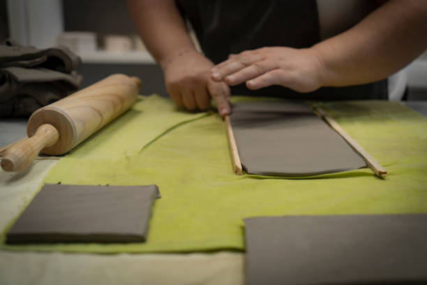 istock Ceramist artist female work in studio 1992057837