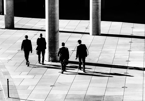 Germany, Berlin, August 30, 2015 - High angle view of four business mens , Berlin Tiergarten