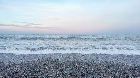 seascape at dawn with pebble beach