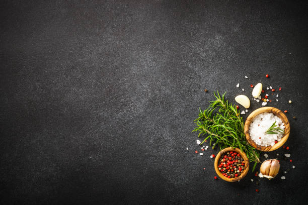 istock Food background with spices, herbs and utensil on white background. 1992156332