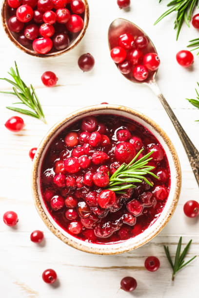 istock Cranberry sauce in a bowl top view. 1992165365