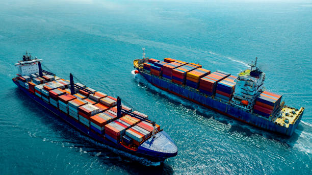 istock Aerial view of the freight shipping transport system two cargo ship container. international transportation Export-import business, logistics, transportation industry concepts 1992173327