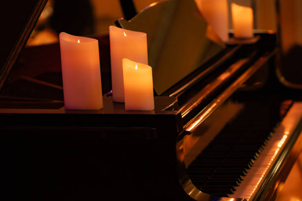 istock candles on classic piano for design purpose 1992174456