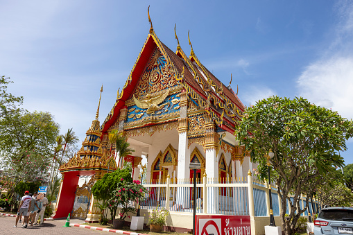 Ornate pointed golden roof at Wat Songkhram, Bangkok, Thailand