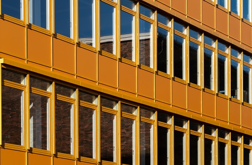 Germany, Berlin - January 29, 2024 - Full frame of windows of modern office building, Berlin Tempelhof