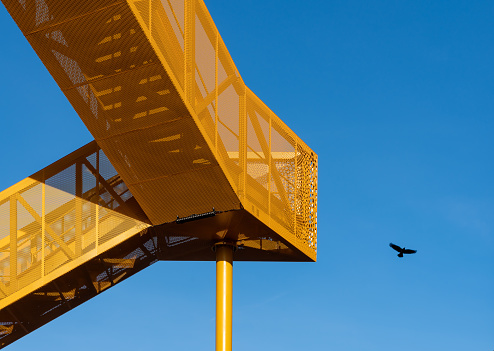 Germany, Berlin - January 29, 2024 - Low angle view of yellow stairway against clear sky, Berlin Tempelhof