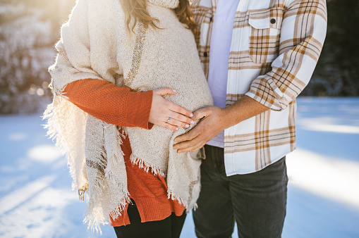 Maternity Photo Shoot. Young couple in anticipation of their future child.