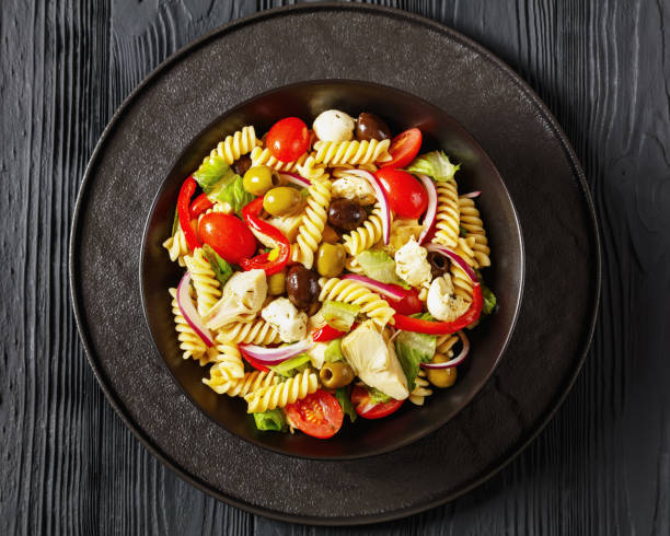 istock fusilli salad with mozzarella, veggies in a bowl 1992219757
