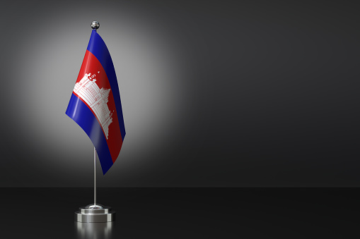 Small Cambodia Flag in Front of Black Background, 3d Rendering