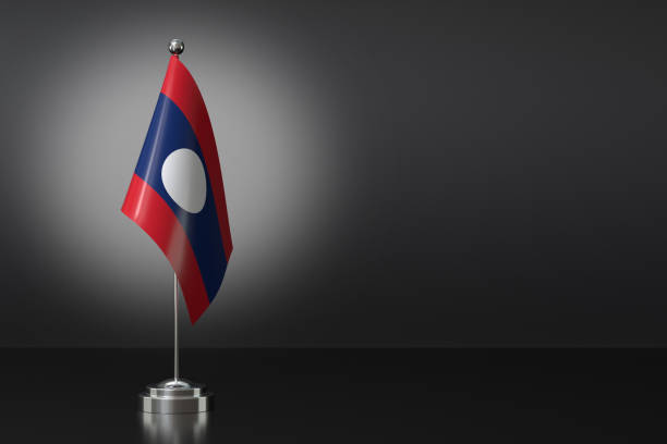 istock Small Laos Flag in Front of Black Background, 3d Rendering 1992229907