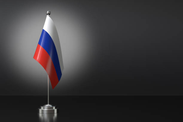 istock Small Russia Flag in Front of Black Background, 3d Rendering 1992229933
